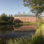 A view of the Chemistry Building from the other end of Swan Lake. (Sean Flynn/UConn Photo)