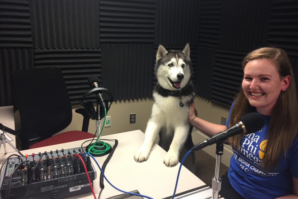 Jonathan XIV at the UConn 360 studios, with one of his handlers, APO Husky Committee co-chair Marie-Claire “M.C.” Meadows ’20 (CLAS). (UConn Photo)