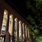 The beautifually restored facade of the Hartford Times building, which is now UConn Hartford, at night. (Peter Morenus/UConn Photo)