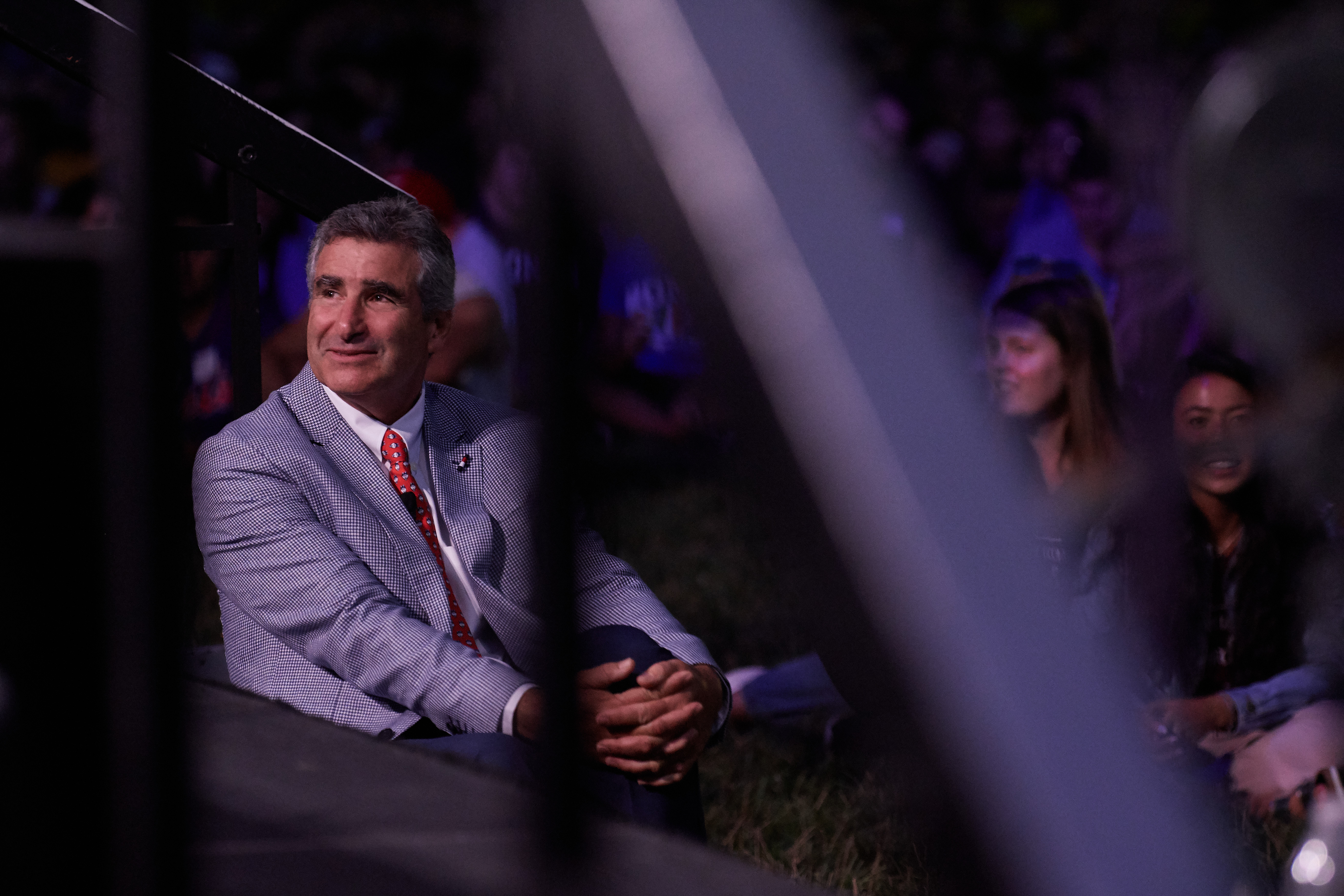 President Tom Katsouleas listens to a speaker while sitting along the stage at the the Convocation ceremony on the Student Union Mall on Aug. 23. (Peter Morenus/UConn Photo)