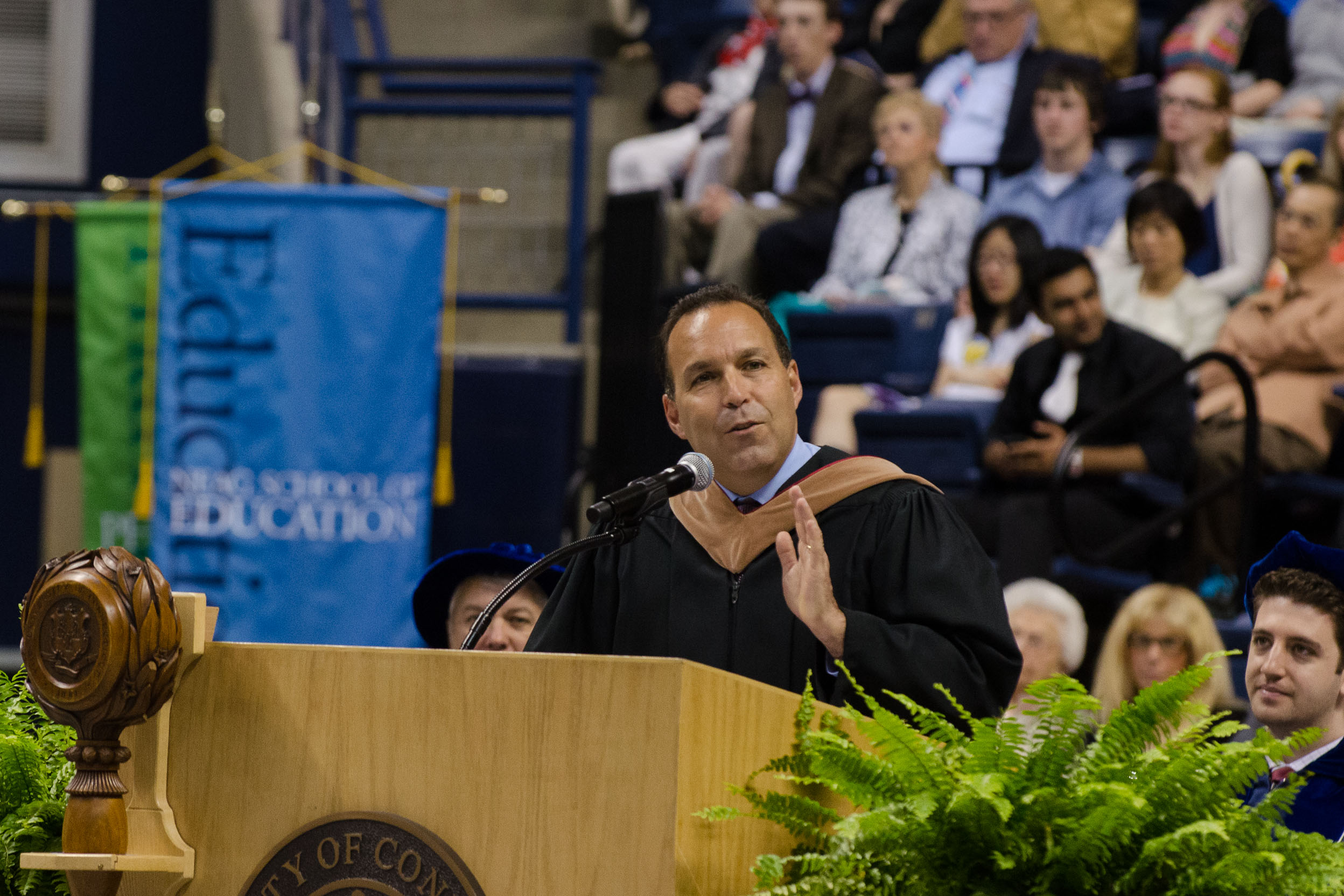 Daniel Toscano '87 (BUS) gives the keynote address at the School of Business Commencement ceremony held at Gampel Pavilion on May 12, 2013. (Ariel Dowski/UConn Photo)