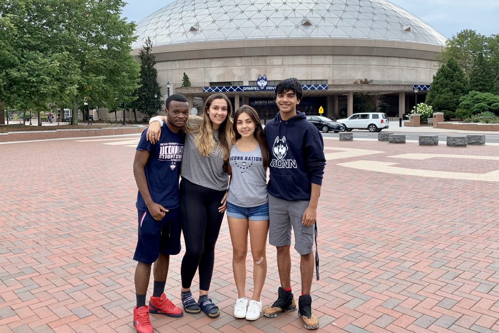 UConn’s Class of 2023 includes more than 5,400 incoming freshmen, about 77% of whom live in Connecticut, including (L to R): Heri Mulungula of New Haven, Julia Lawler of Ridgefield, Sarah Ibrahim of Coventry, and Areez Rahim of Avon. (Stephanie Reitz/UConn Photo)