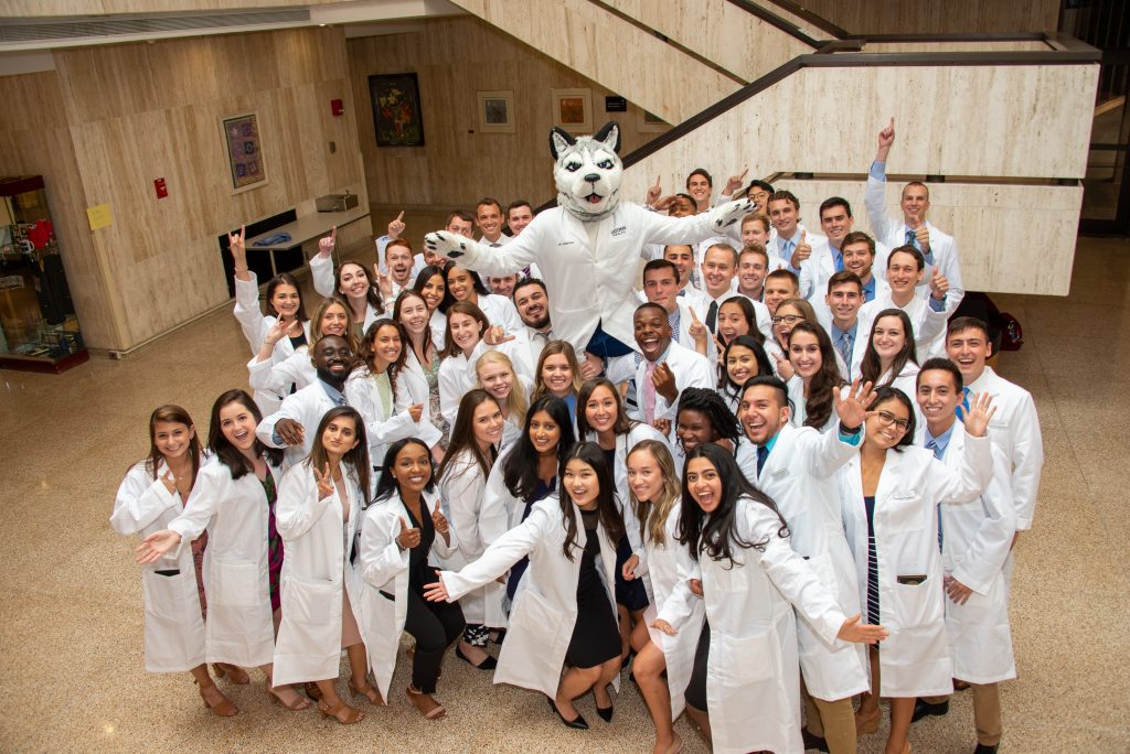 Fifty-four students in the UConn School of Dental Medicine Class of 2023 (pictured) received their white coats on Aug. 23, along with UConn School of Medicine's 110 new medical students. (Tina Encarnacion/UConn Health photo)