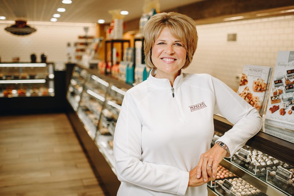 Karen Munson, the president of Munson's Chocolates, in her retail store in Bolton, CT. At this location, Munson's produces 350,000 pounds of chocolate per year. (Nathan Oldham / UConn School of Business)