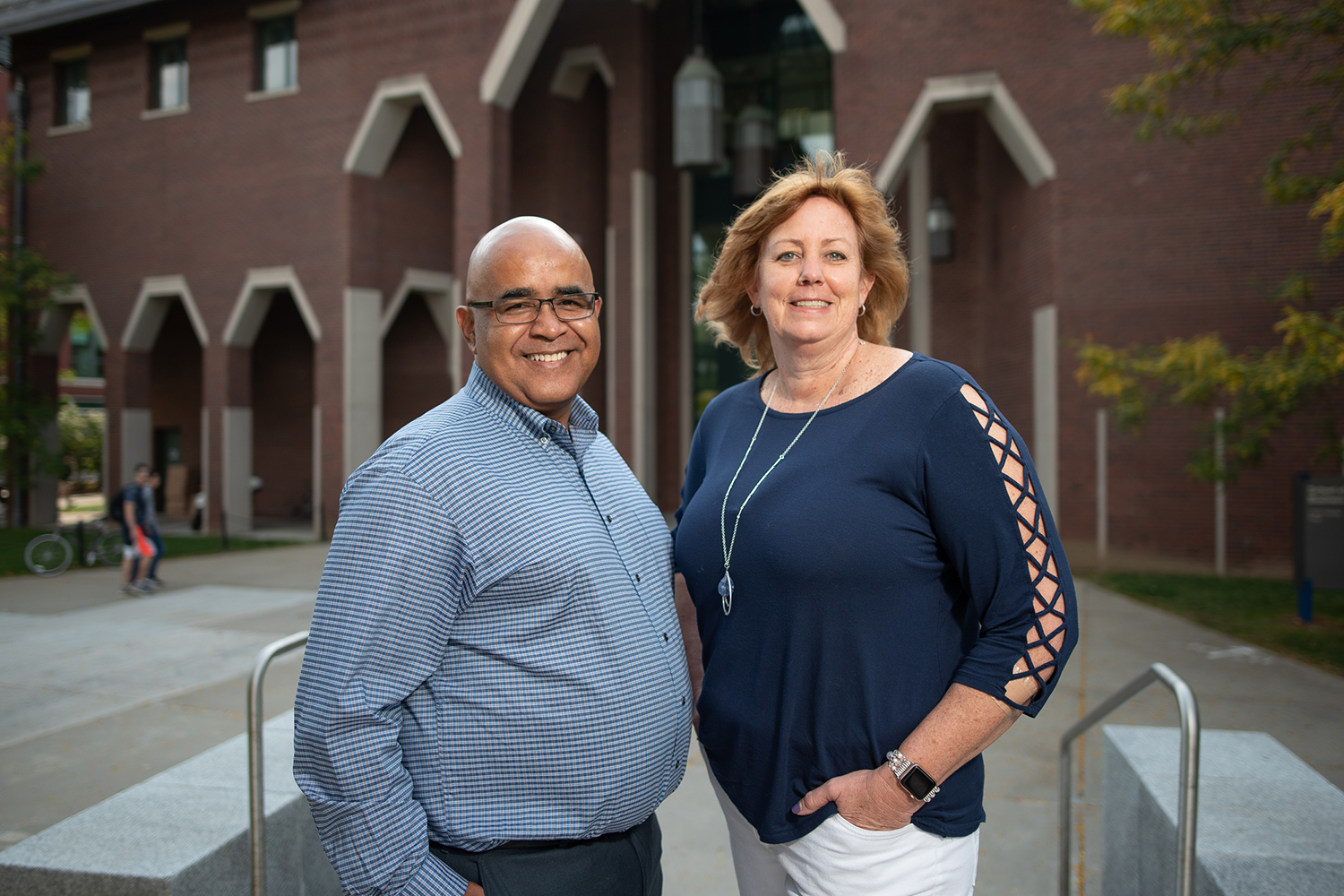 Jose M. Cruz (left) and Lucy Gilson (right) have been named associate deans in the UConn School of Business. Gilson has taken on the mantle of associate dean for faculty and outreach, while Cruz is now the associate dean for graduate programs. (Nathan Oldham / UConn School of Business)