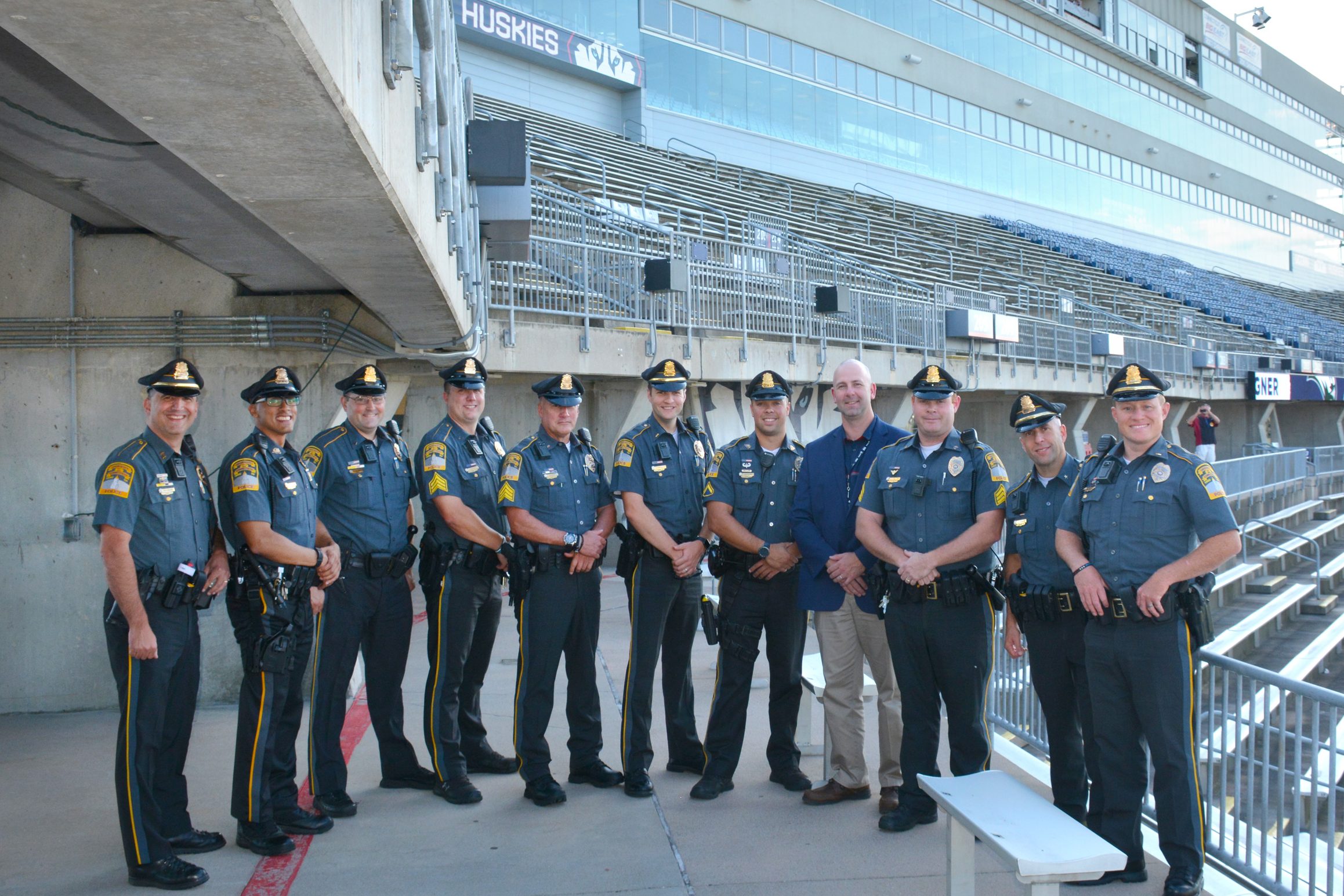 From left to right, Chief Hans D. Rhynhart ’93 and ’18; Officer Alex Rodriguez ’14; Sgt. Peter Harris ’03; Sgt. Justin Cheney ’07; Sgt. Marc Hanna ’88; Lt. Matthew C. Zadrowski ’07; Officer Tyler Hopson ’13; Lt. Darren Cook ’94; Sgt. Mark Bouthillier ’07; Deputy Chief Andrew Fournier ’95 ’01; Lt. Justin Gilbert ’06. UConn grads not pictured: Officer Robin Kiddy; Sgt. Zachary Ladyga; Officer Joseph Conetta. (Submitted Photo)