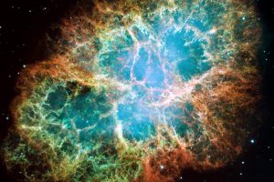 In this handout from NASA in 2005, the mosaic image, one of the largest ever taken by NASA's Hubble Space Telescope of the Crab Nebula, shows six-light-year-wide expanding remnant of a star's supernova explosion. Japanese and Chinese astronomers witnessed this violent event nearly 1,000 years ago in 1054, together with, possibly, Native Americans. The orange filaments are the remains of the star and consist mostly of hydrogen. The rapidly spinning neutron star embedded in the center of the nebula is the dynamo powering the nebula's eerie interior bluish glow. The blue light comes from electrons whirling at nearly the speed of light around magnetic field lines from the neutron star. The neutron star, the crushed ultra-dense core of the exploded star, ejects twin beams of radiation that appear to pulse 30 times a second due to the neutron star's rotation. (Photo by NASA via Getty Images)