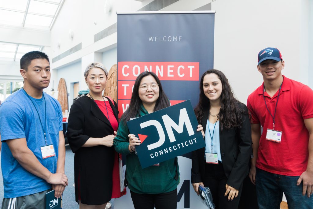 UConn students Jason Chan, Hannah Lim, Danielle McMurty and Jamison Cote (l-to-r) with Heejo Gwen Kim, assistant professor of motion design (second from left). (Cat Boyce SFA ‘15, ’19/ UConn Photo)