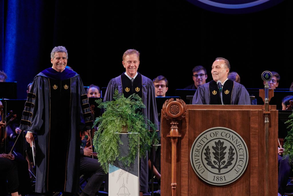 President Thomas Katsouleas, left, Gov Ned Lamont and Dan Toscano '85 (BUS), chair of the board of trustees, during the inauguration ceremony held at the Jorgensen Center for the Performing Arts on Oct. 4, 2019. (Peter Morenus/UConn Photo)
