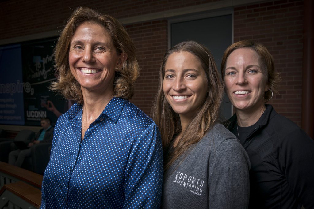 From left professor Laura Burton, Karen Chammas, visiting UConn's Sport Management faculty as part of a Global Mentorship Program, and Professor and Department Head Jennifer McGarry at the Neag School of Education on Oct. 31, 2019. (Sean Flynn/UConn Photo)