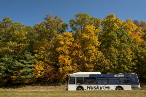 A HuskyGo bus on Discovery Drive on Oct. 15, 2019. (Sean Flynn/UConn Photo)