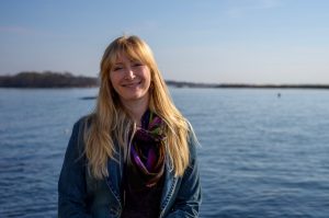 A picture of Samantha Siedlecki on the water at Long Island Sound.