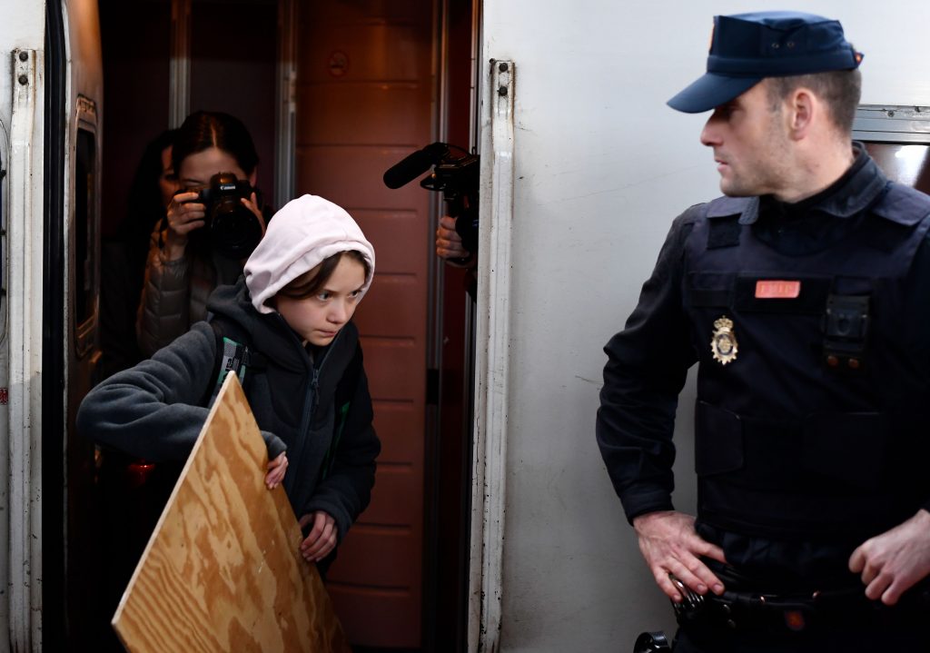 Young Swedish activist Greta Thunberg, one of the activists that gives hope to professor Mark Urban, arriving at a climate protest in Spain.