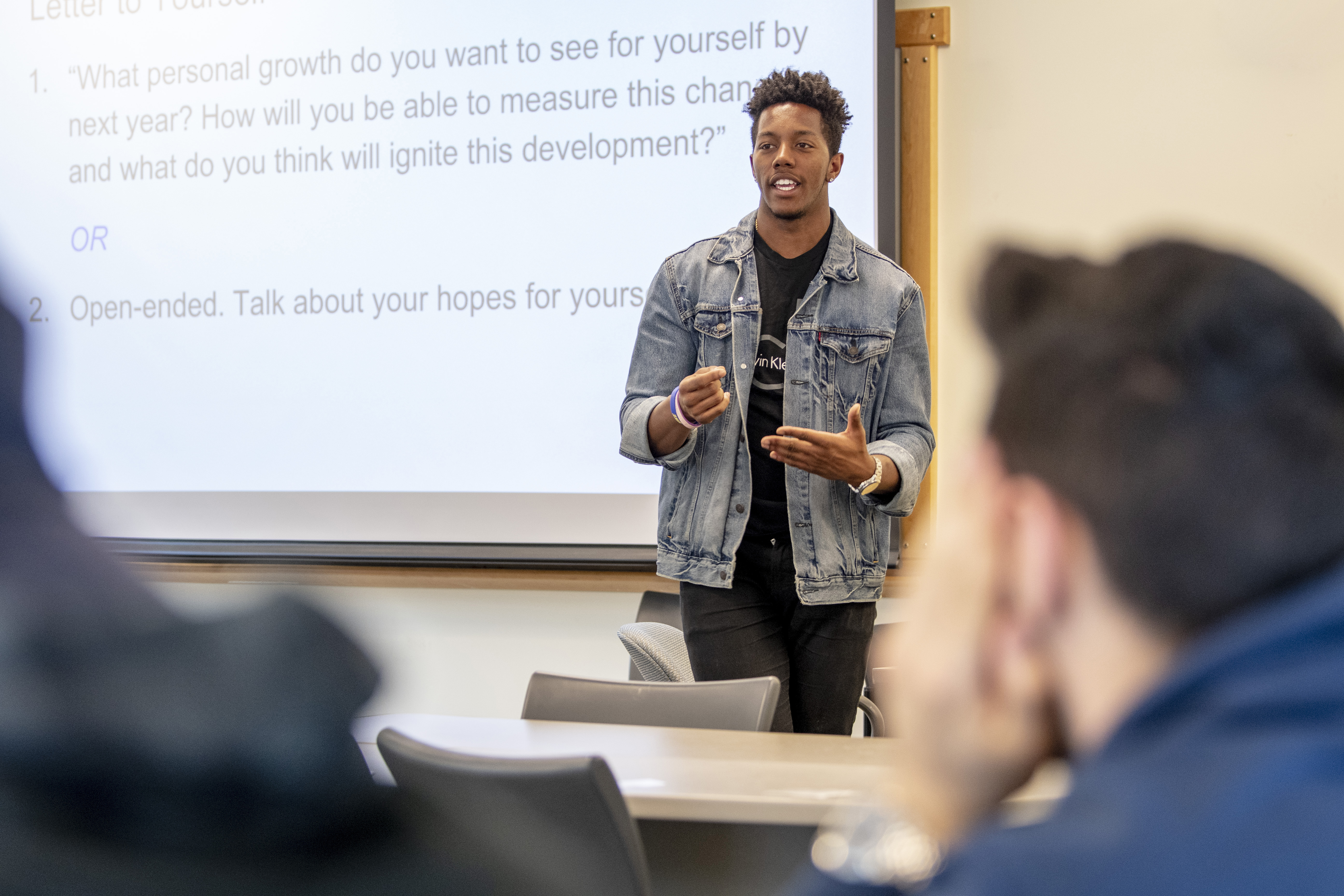 Student Shane Young teaching a First-Year Experience class at UConn.