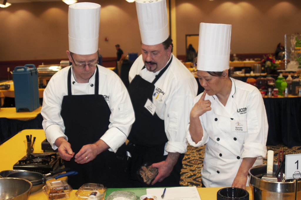 Chefs workign in a culinary competition