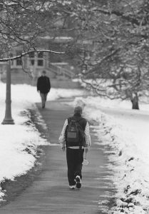 Students walking the paths of the (old) South Campus in the winter of 1995. (UConn File Photo)
