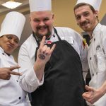 From left, chef Lucinda Simms, Gary Ellis, and Curtis Bangs having some fun at the 20th annual Culinary Olympics at UConn on Jan. 14, 2020. (Sean Flynn/UConn Photo)