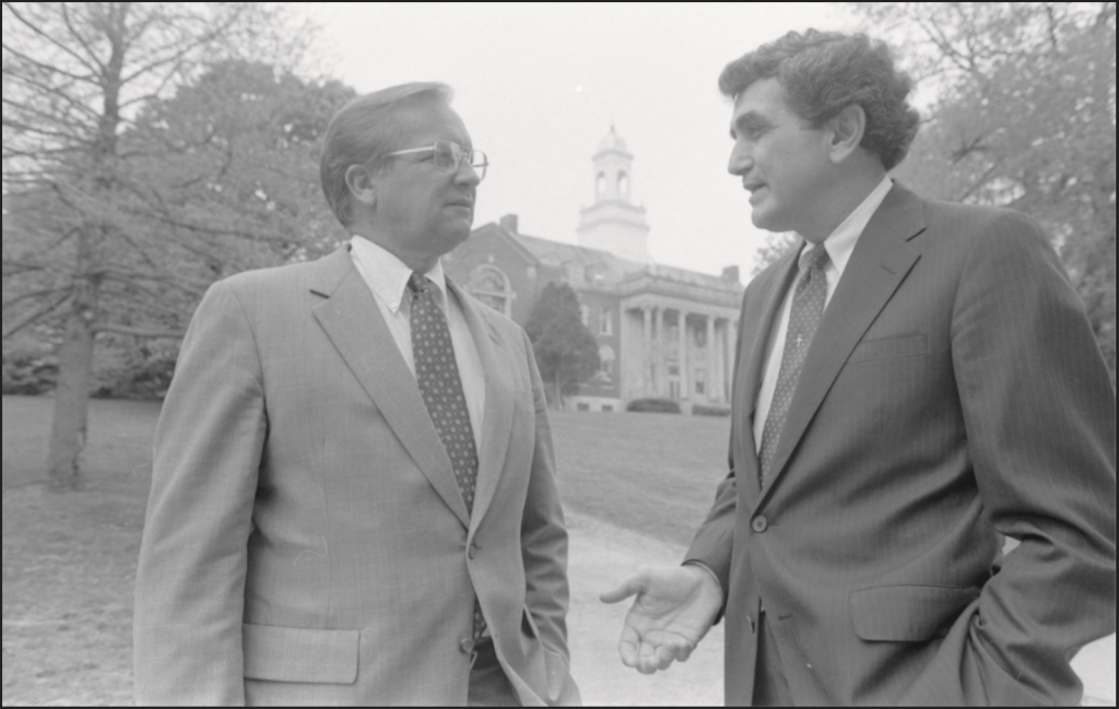 John DiBiaggio, right, UConn's 10th president, speaks with a visitor to campus in 1985. (Archives & Special Collections, UConn Library)