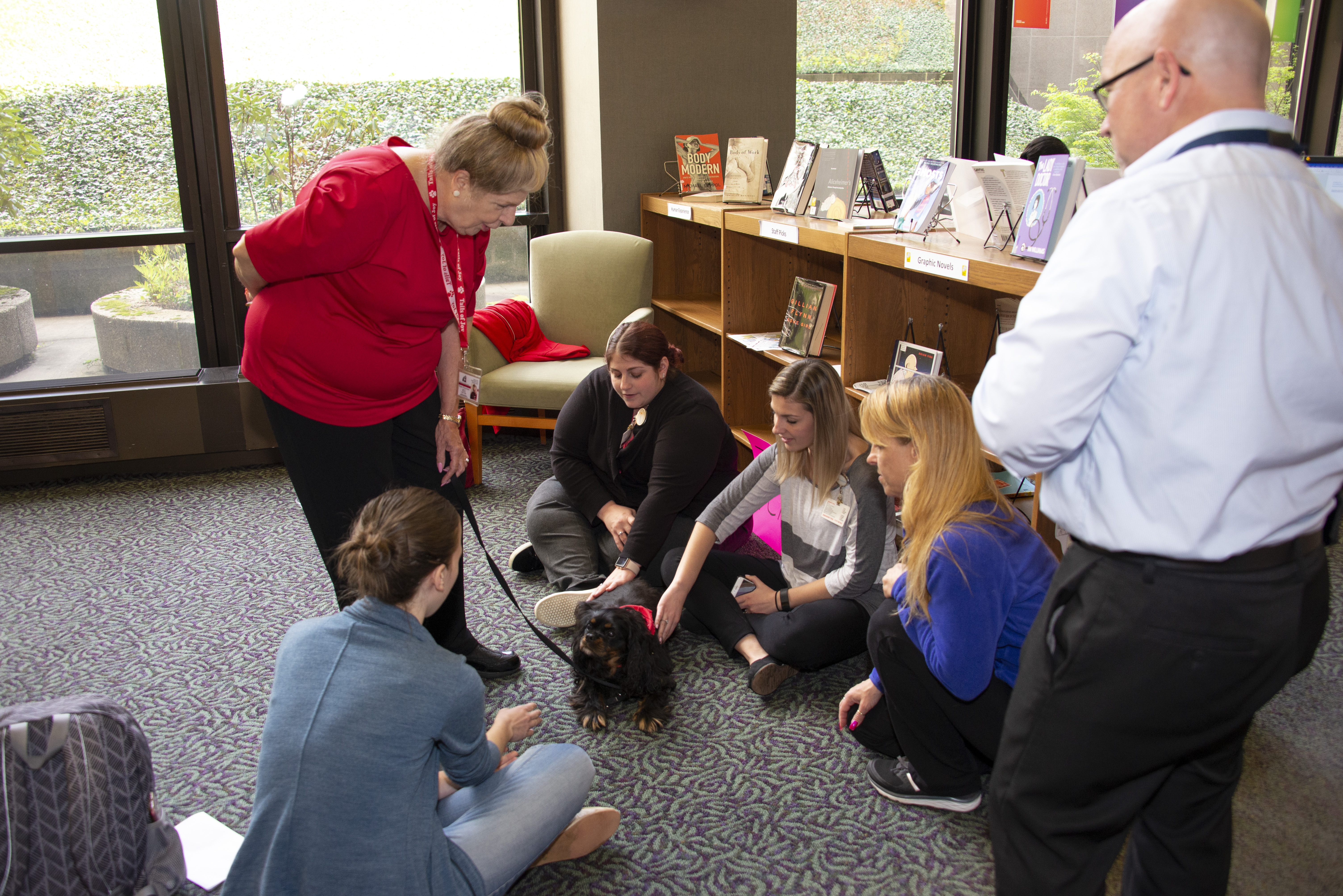 Med students petting therapy dog