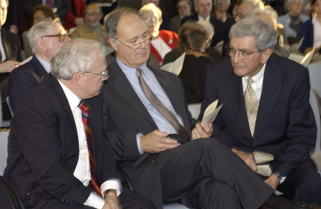 John DiBiaggio, right, speaks with fellow former UConn presidents Harry Hartley, left, and John Casteen at the rededication of the Wilbur Cross Building in 2002. 