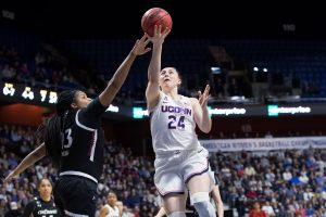 UConn guard Anna Makurat heads for the rim during UConn's victory in the AAC tournament final on Monday. (Stephen Slade / UConn Athletic Department)