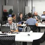 Participants working at the Evidence Synthesis Hackathon in Australia in 2019. (Courtesy of Neal Haddaway)