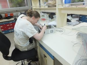 UConn Prof. Christina Baer assembling a portable heater. (Photo by Bree Mora)