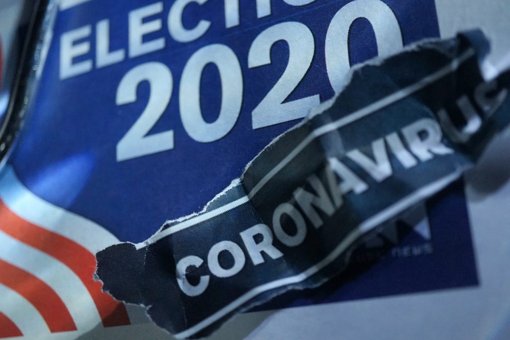 An illustration showing a placard saying "Election 2020" overlaid with a strip of paper saying "coronavirus"