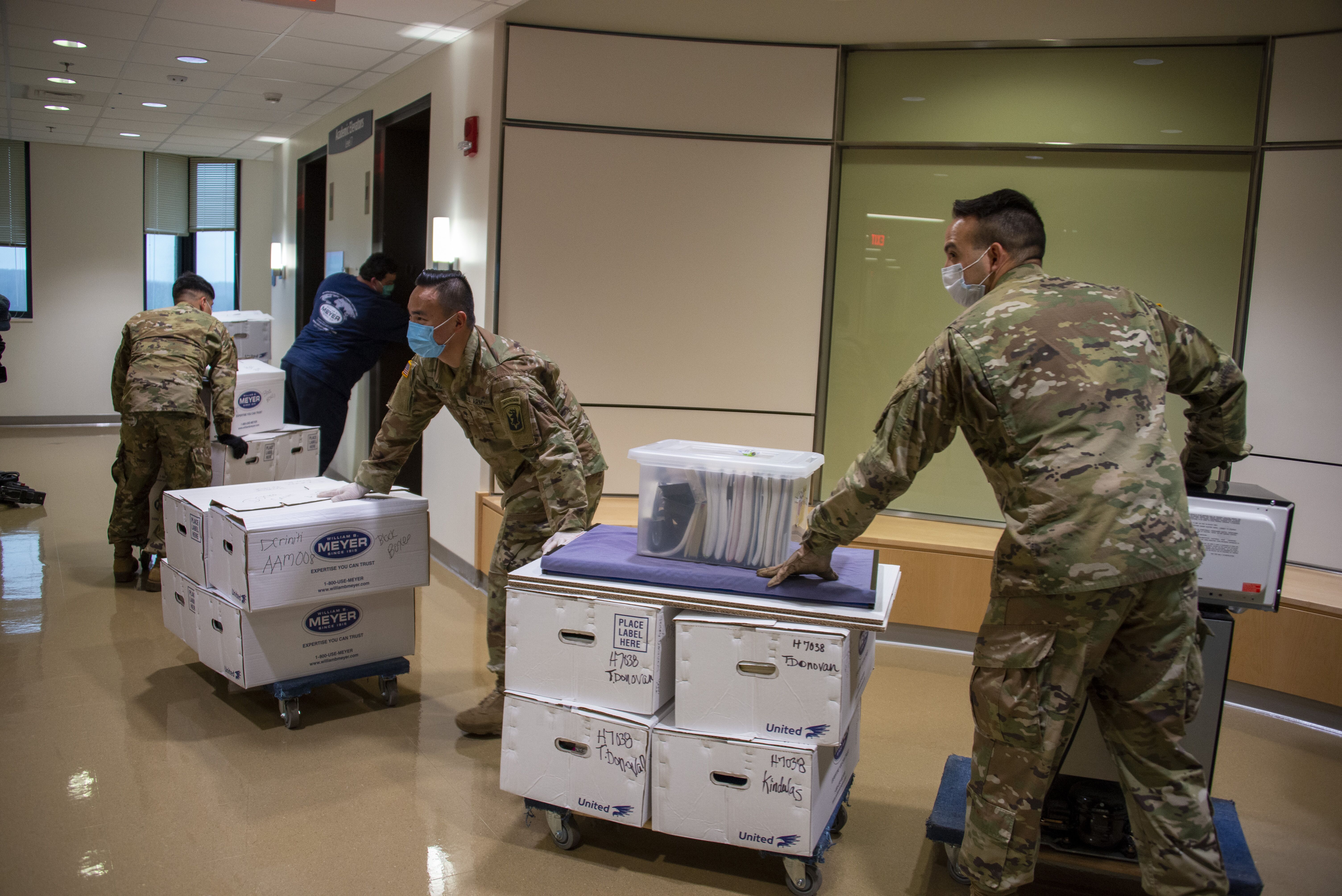 Members of the Connecticut National Guard came to UConn Health to help clean out offices and set up hospital rooms in the Connecticut Tower of UConn John Dempsey Hospital. April 13, 2020 (Tina Encarnacion/UConn Health photo)