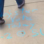 A chalk invitation to register to vote seen outside the Chemistry Building on Oct. 25, 2016. (Peter Morenus/UConn Photo)