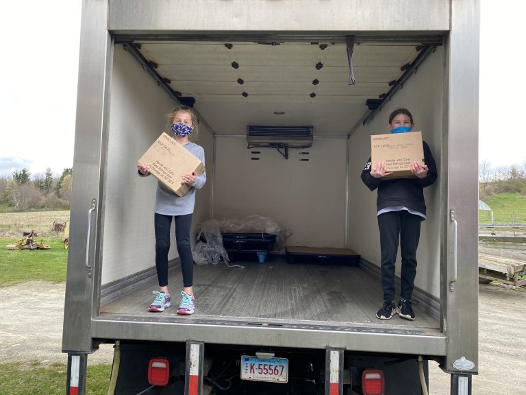 Volunteers help with Operation Community Impact, a UConn Extension program that assists Connecticut dairy farmers and food pantries (Contributed photo).