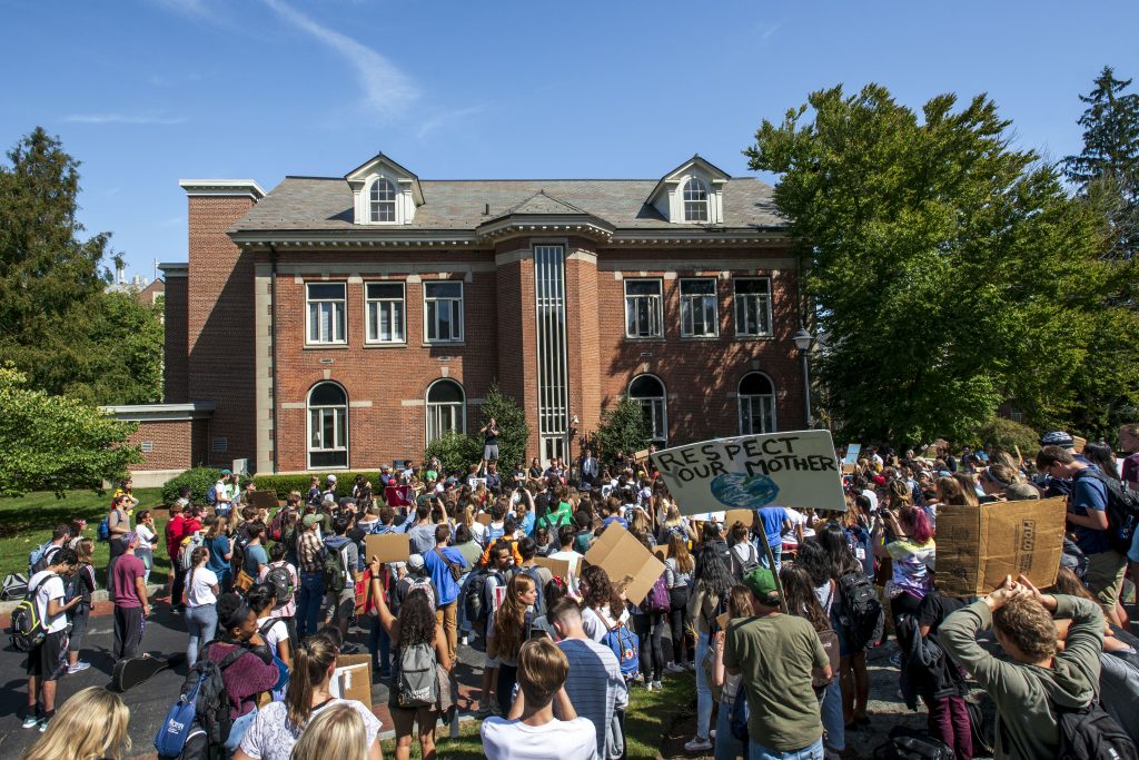 President Katsouleas talks with students about the Climate Strike outside Gulley Hall on Sept. 20, 2019. (Sean Flynn/UConn Photo)