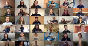 A screen showing members of the UConn Choirs performing online.