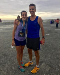 father and daughter after the race by the shore