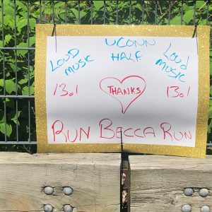 A sign cheering on UConn Health's Dr. Rebecca Andrews, who ran a 'virtual' half-marathon to raise money for combating COVID-19.