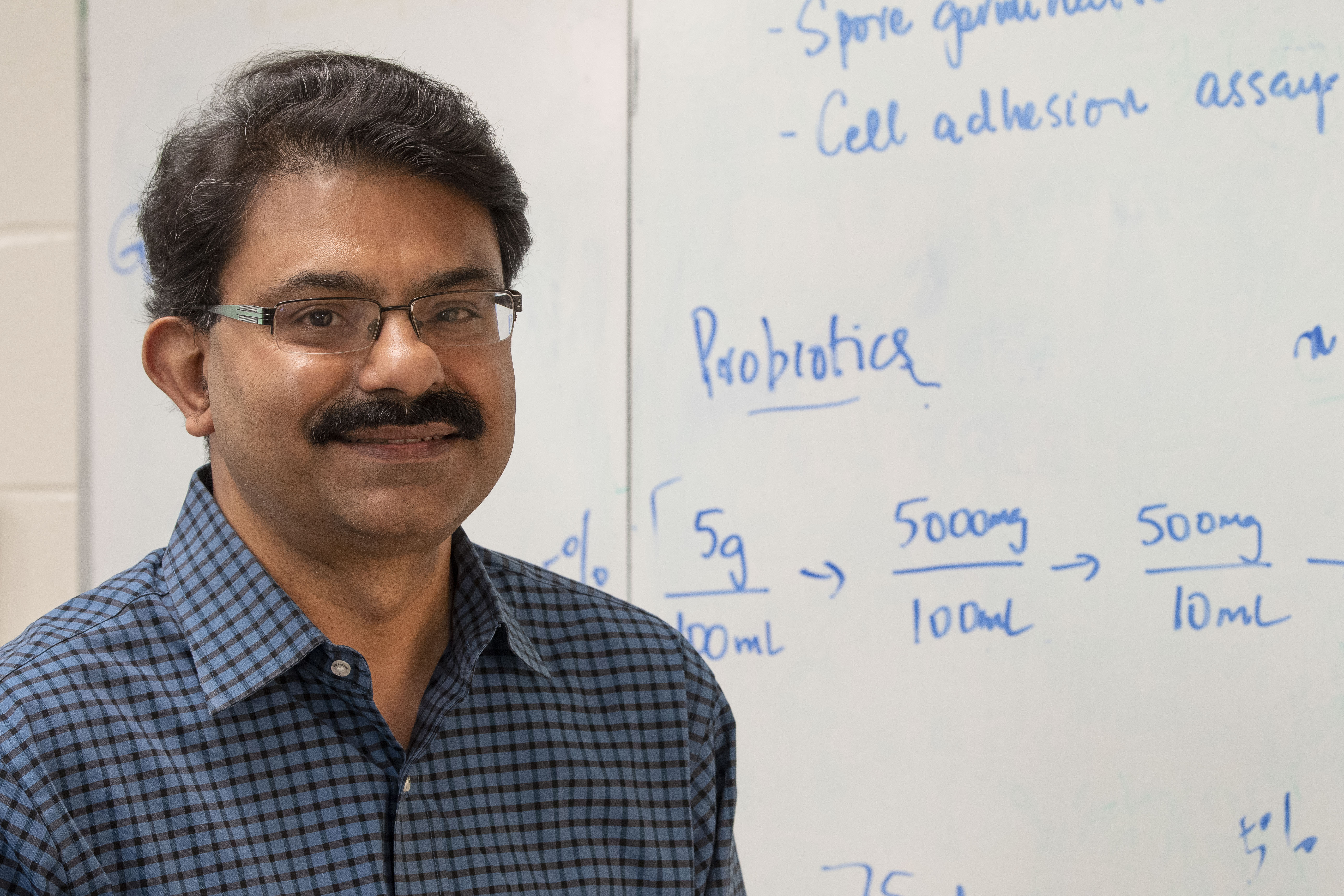 Researcher Kumar Venkitanarayanan at his lab in the George White Building.