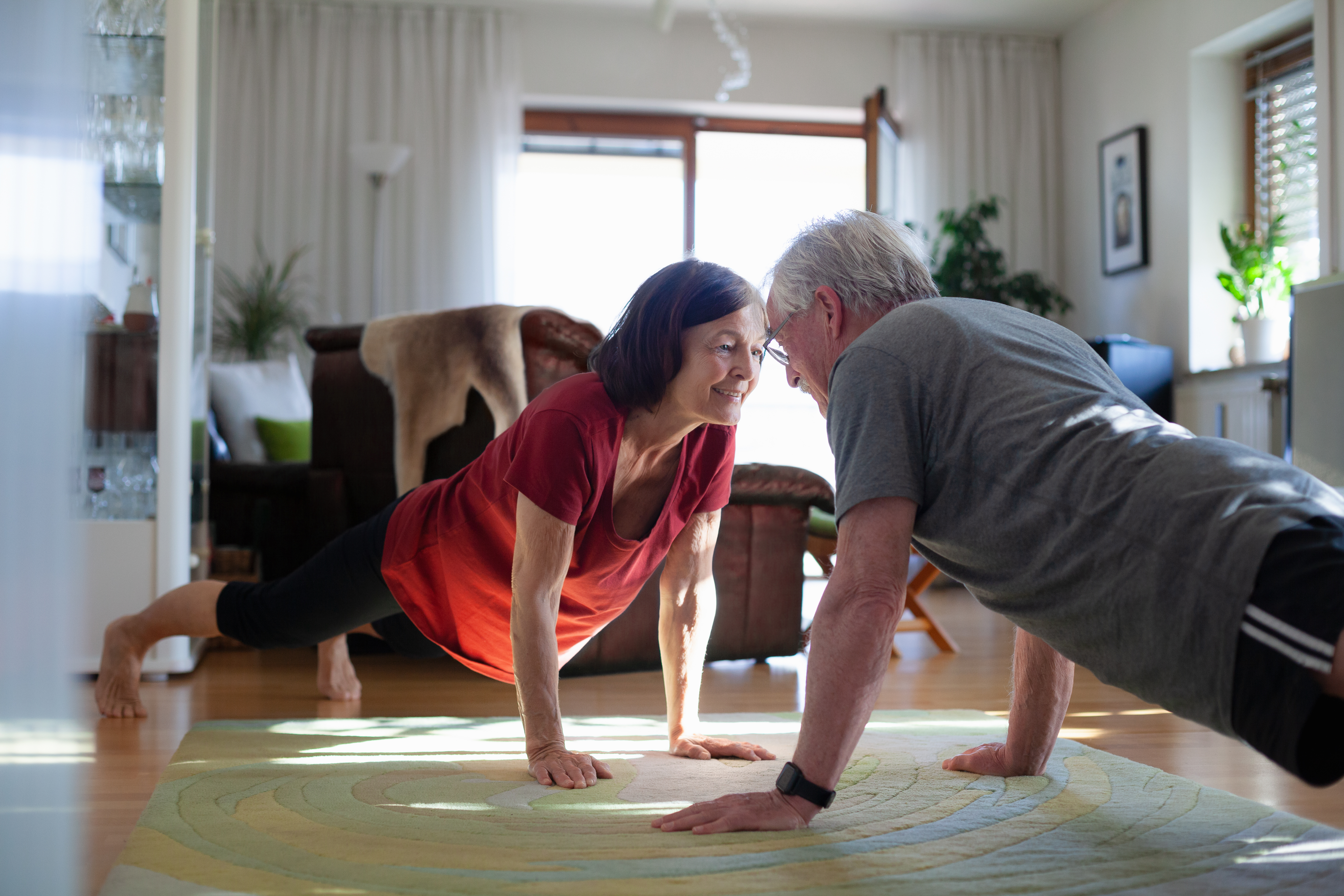 Senior couple staying home and staying fit during COVID-19 lockdown