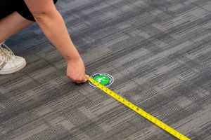 Workers prepare classrooms for the era of social distancing (Sean Flynn/UConn Photo)