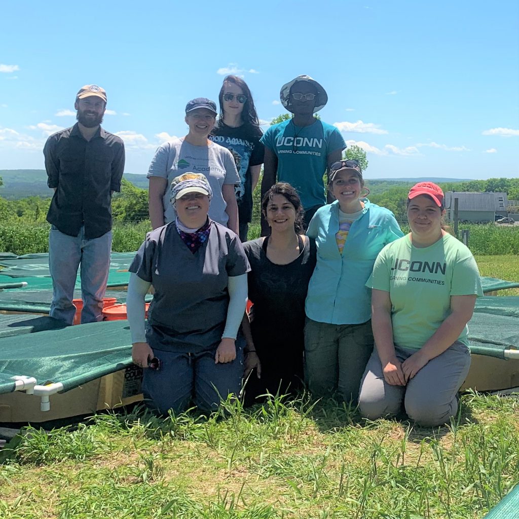 UConn Professor Tracy Rittenhouse (back row, second from left) and some students who worked with her on the tadpole research project.