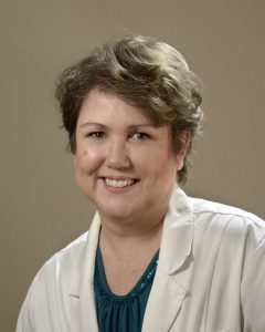A portrait of assistant clinical professor Valorie MacKenna.