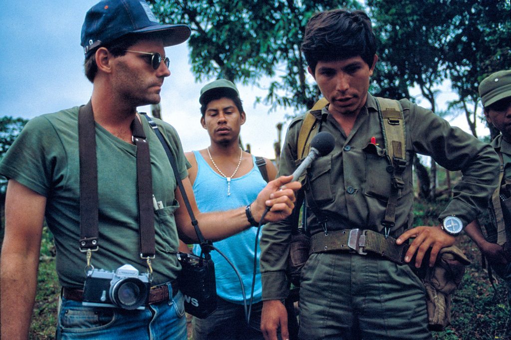 Scott Wallace interviewing an officer from the Sandinista Popular Army