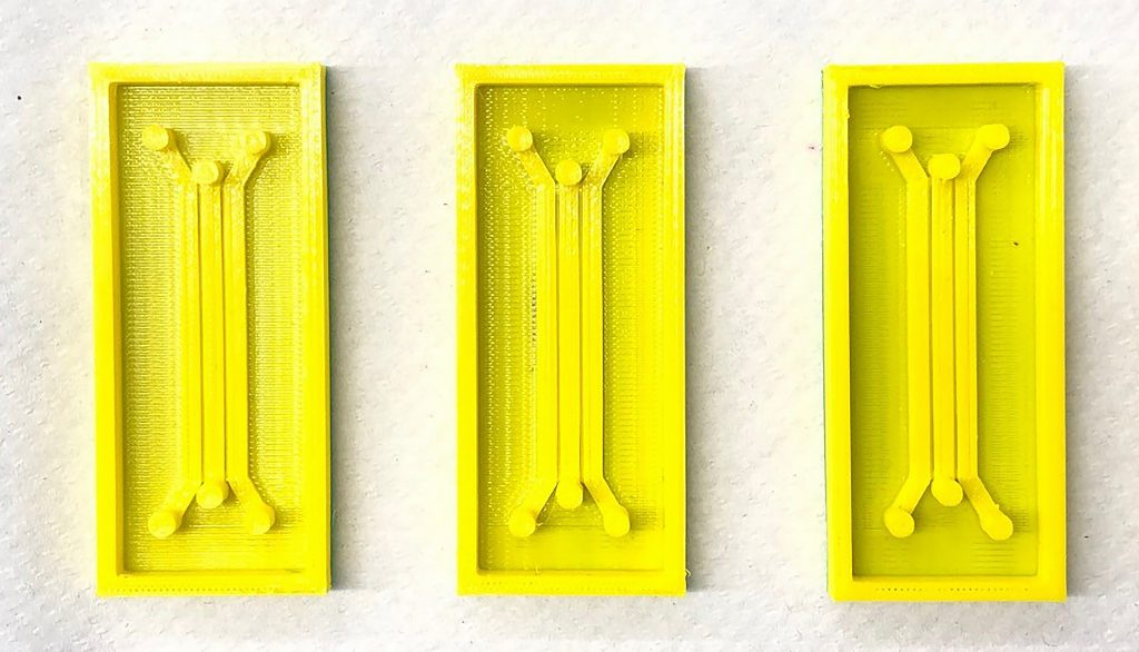 A 3D printed slide with micro channels for cartilage to regrow upon. The channels also carry nutrients to the young cartilage cells.