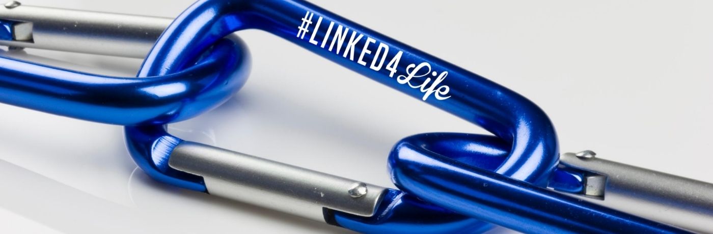 A carabiner that says #Linked4Life