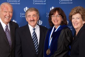 Ray Neag ’56 (CLAS), Professors Joseph Renzulli and Sally Reis, and Carole Neag (l-r) gather after the Letitia Neag Morgan Chair in Educational Psychology Investiture for Reis in 2011.