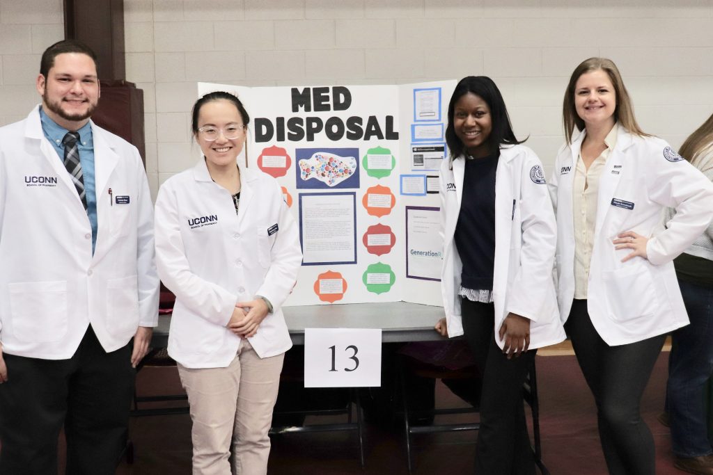 School of Pharmacy students provide information on medication disposal at a community event for seniors in 2019