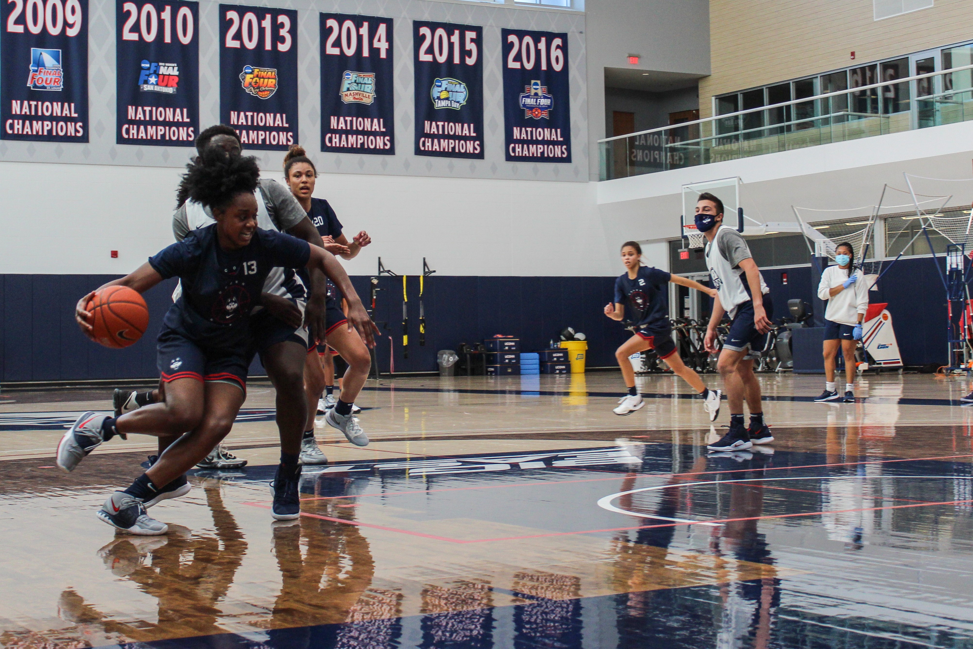 The UConn women's basketball team practicing ahead of the start of their season, which was delayed by the pandemic.