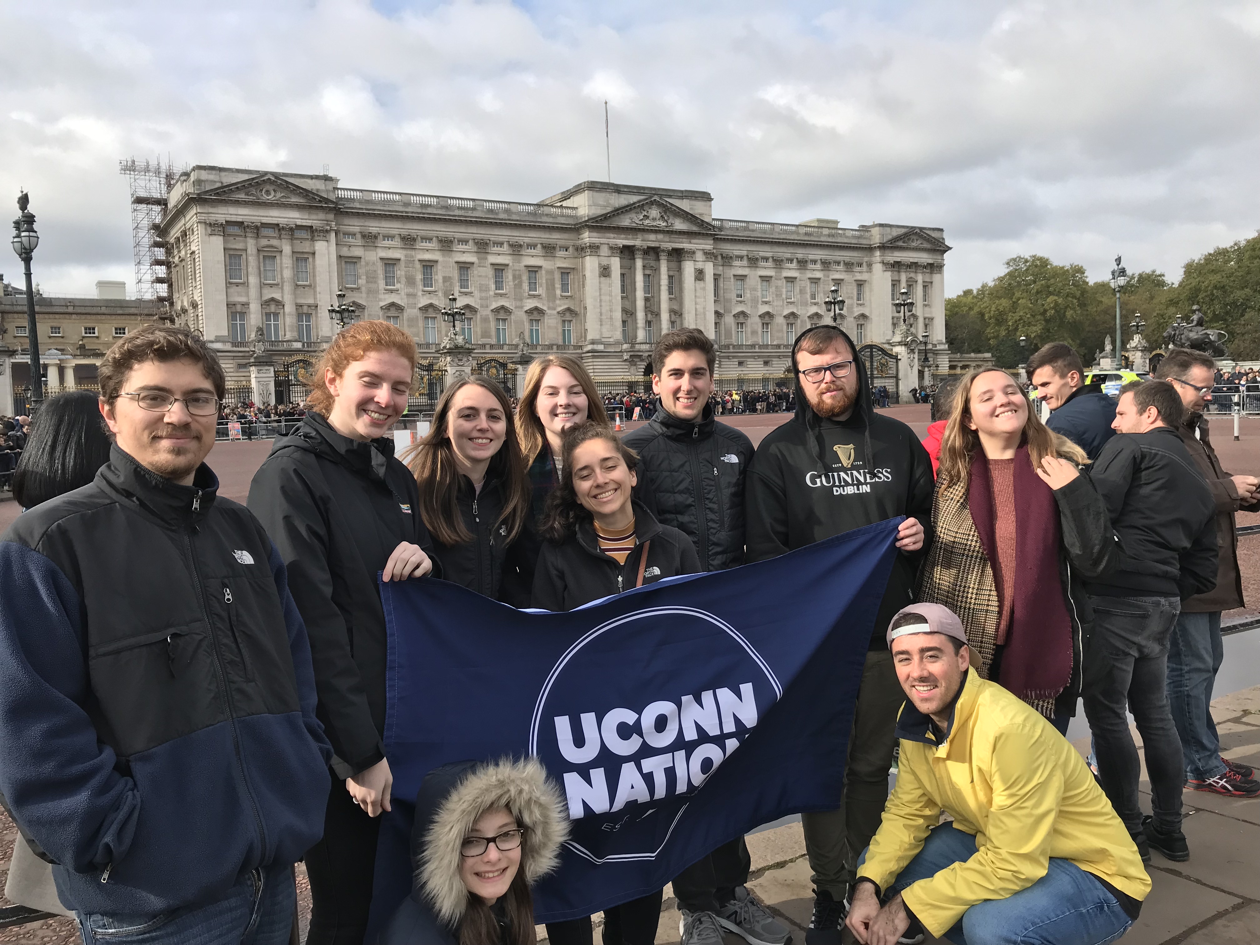 College students gather in front of Buckingham Palace in London.