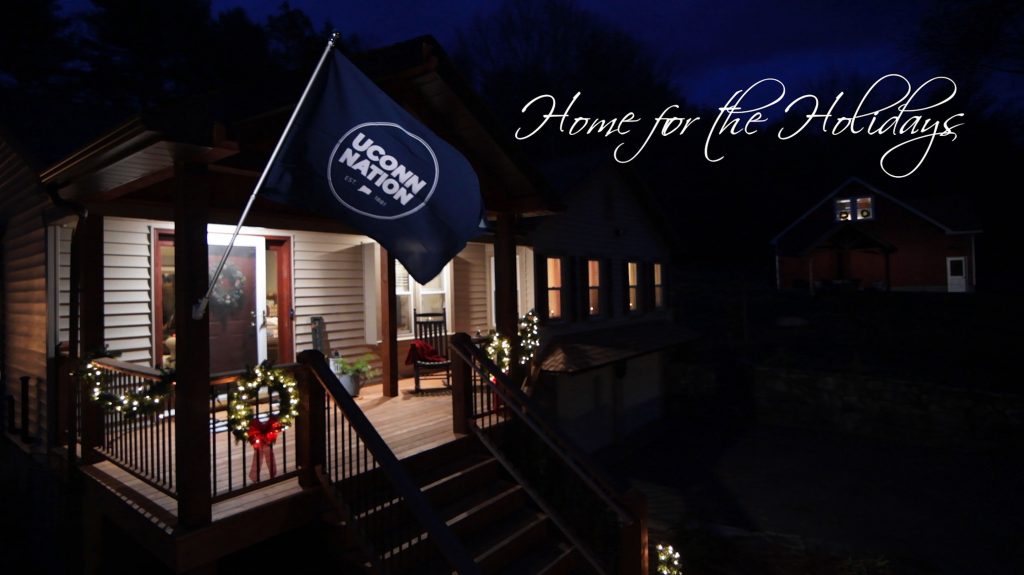 Photo of a house with a UConn Nation flag flying