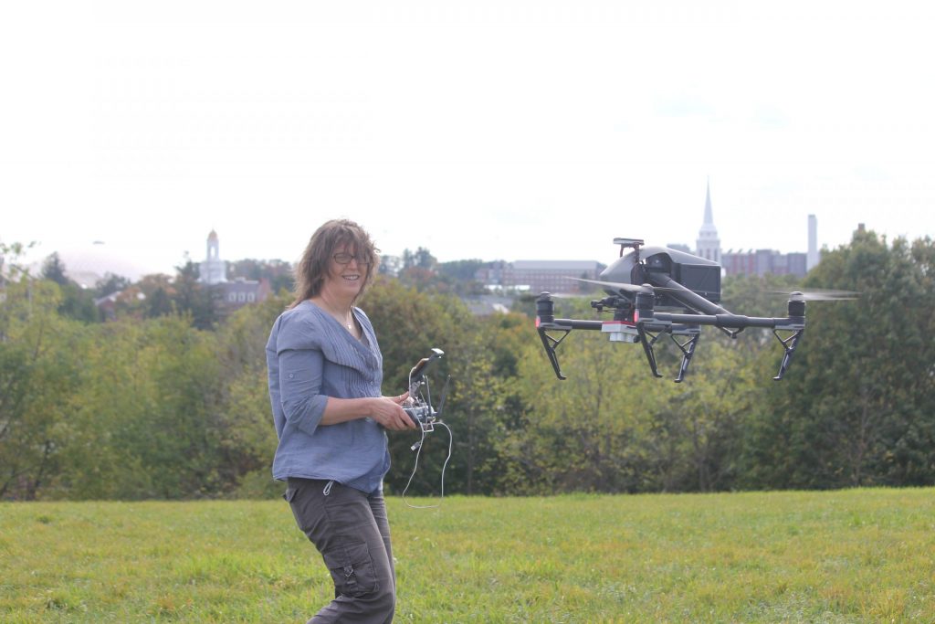 Nancy Marek, Ph.D. candidate in NRE, operates a drone.