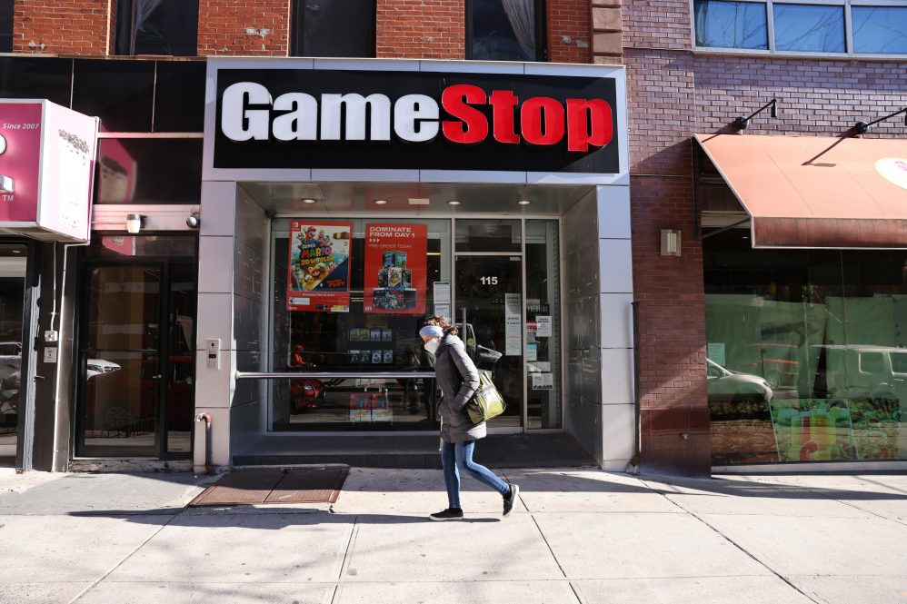 People walk by a GameStop store in Brooklyn on January 28, 2021 in New York City